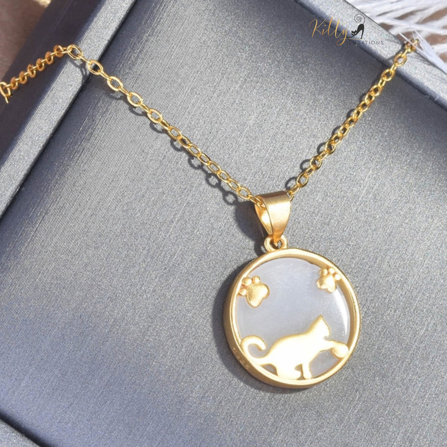 Playful Cat Natural Jade Necklace in Solid 925 Sterling Silver (Gold Plated) ($48.32): https://www.kittysensations.com/products/playful-cat-natural-jade-necklace-in-solid-925-sterling-silver-gold-plated?_pos=2&_psq=PLAYFUL+CAT+JADE&_ss=e&_v=1.0