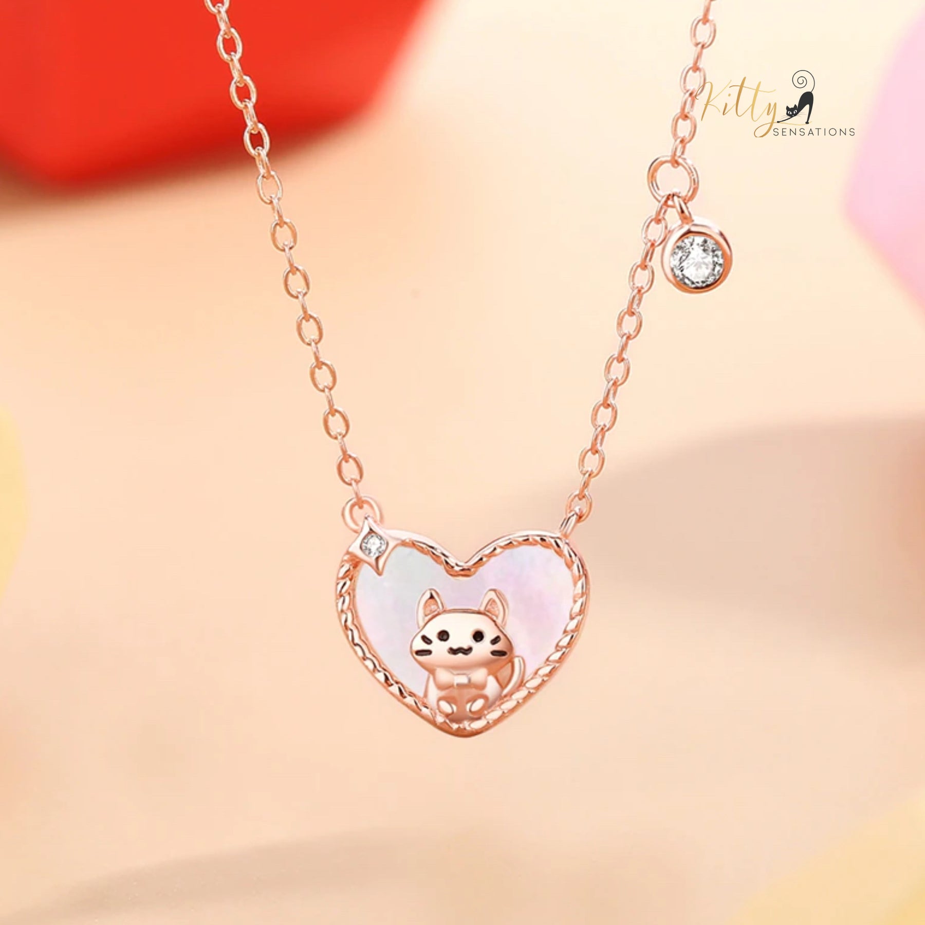 www.KittySensations.com: Raised Kitty in Heart Necklace in Solid 925 Sterling Silver - Rose Gold Plated ($58.04): https://www.kittysensations.com/products/raised-kitty-in-heart-necklace-in-solid-925-sterling-silver-rose-gold-plated