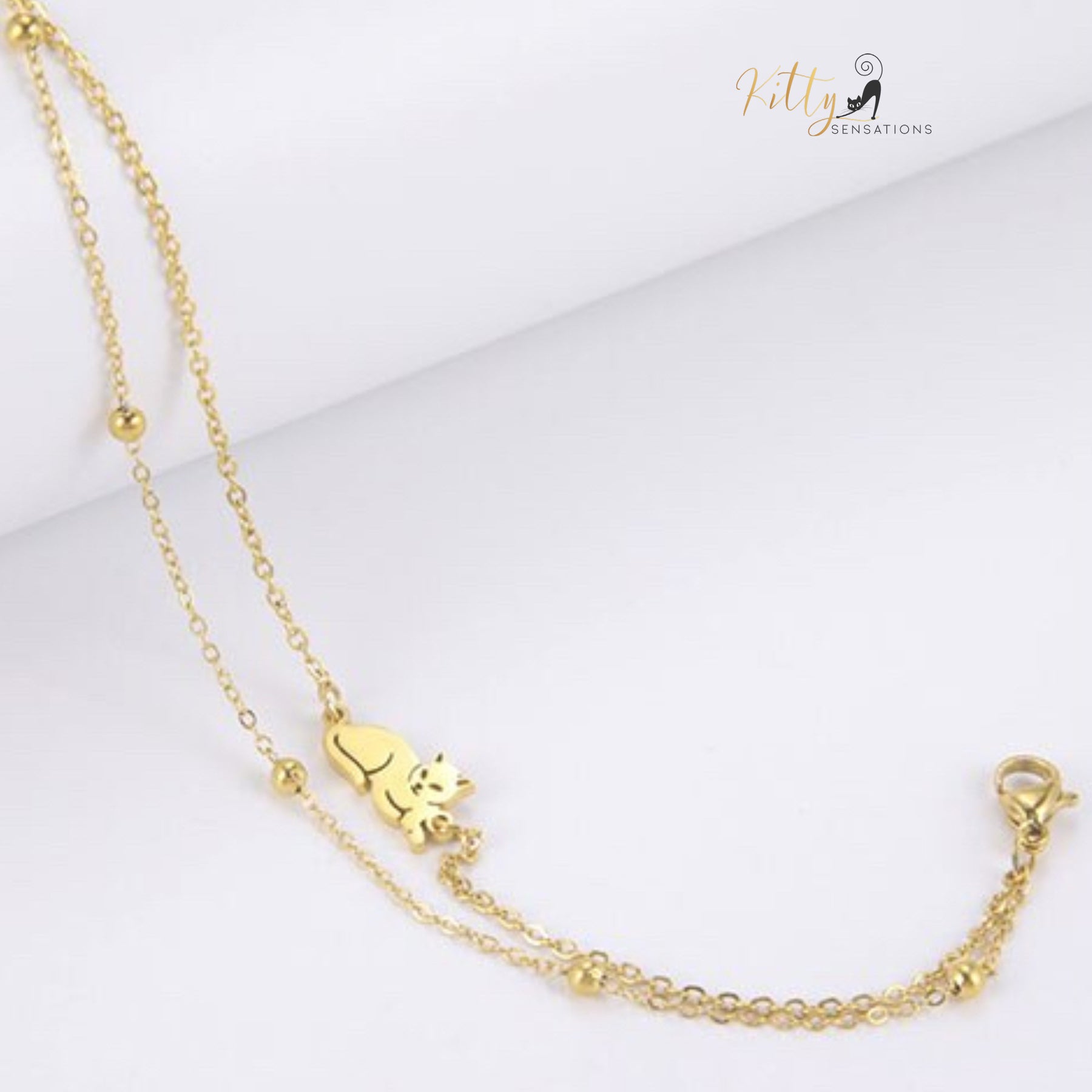 Sitting Cat, Two Chain - Very Feminine - Bracelet (Adjustable Length) ($22.4): https://www.kittysensations.com/products/sitting-kitty-two-chain-very-feminine-bracelet-adjustable-length?variant=40281701974082