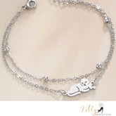 Sitting Cat, Two Chain - Very Feminine - Bracelet (Adjustable Length) ($22.4): https://www.kittysensations.com/products/sitting-kitty-two-chain-very-feminine-bracelet-adjustable-length?variant=40281701974082