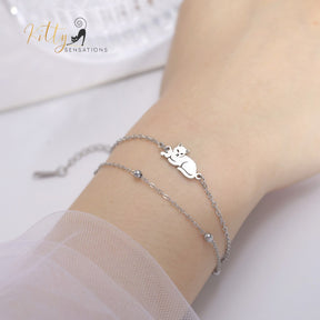 Sitting Cat, Two Chain - Very Feminine - Bracelet (Adjustable Length) ($22.4): https://www.kittysensations.com/products/sitting-kitty-two-chain-very-feminine-bracelet-adjustable-length?variant=40281701974082