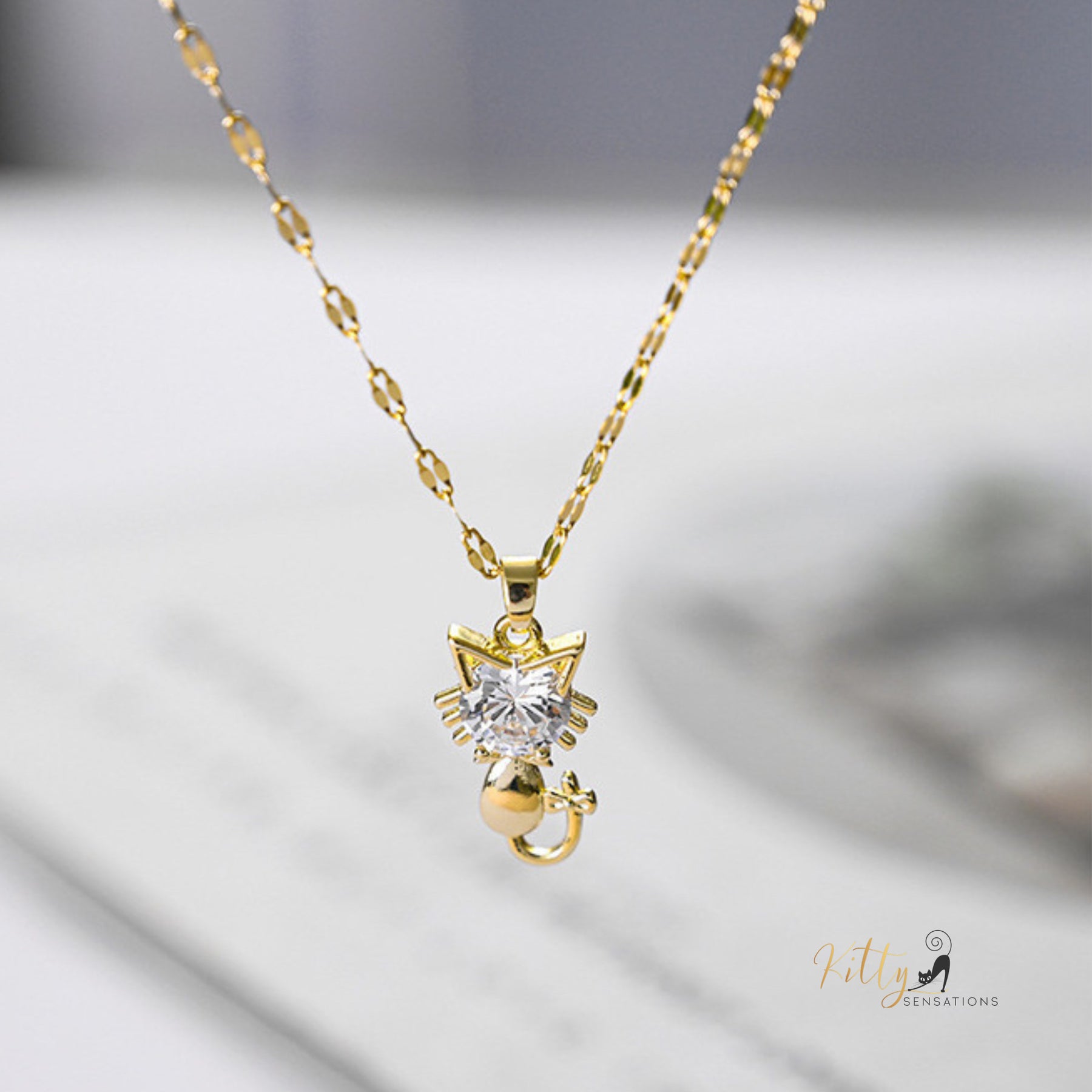 www.KittySensations.com: Tail-Bow Kitty CZ Necklace with Alternating Links Chain - Gold Plated ($15.65): https://www.kittysensations.com/products/tail-bow-kitty-necklace-with-alternating-links-chain-gold-plated