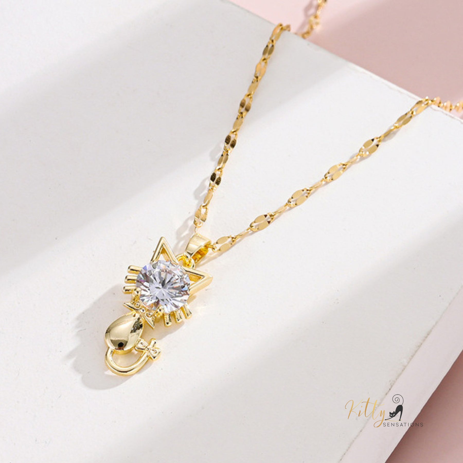 www.KittySensations.com: Tail-Bow Kitty CZ Necklace with Alternating Links Chain - Gold Plated ($15.65): https://www.kittysensations.com/products/tail-bow-kitty-necklace-with-alternating-links-chain-gold-plated