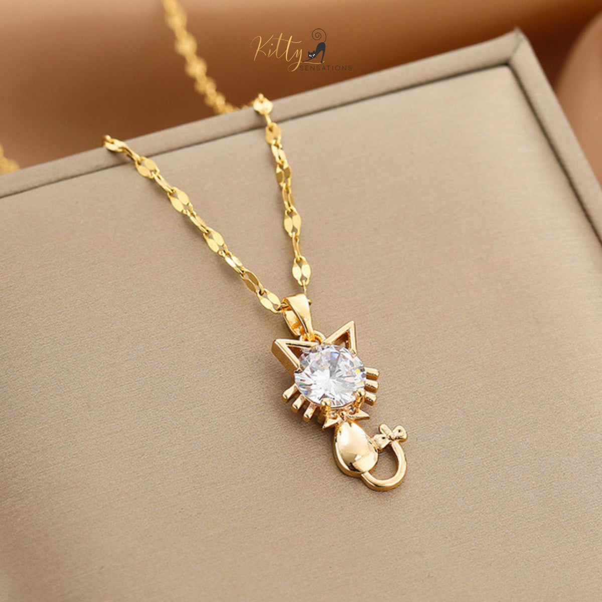 www.KittySensations.com: Tail-Bow Kitty CZ Necklace with Alternating Links Chain - Gold Plated ($15.65): https://www.kittysensations.com/products/tail-bow-kitty-necklace-with-alternating-links-chain-gold-plated