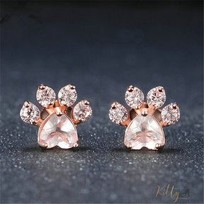 cat paw earrings in rose gold on dark background 12860190-pink