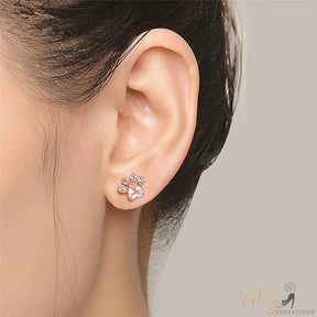 cat paw earring in rose gold worn on ear 12860190-pink