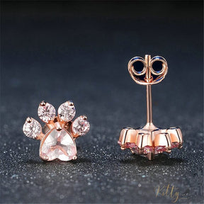 cat paw earrings in rose gold on dark background 12860190-pink