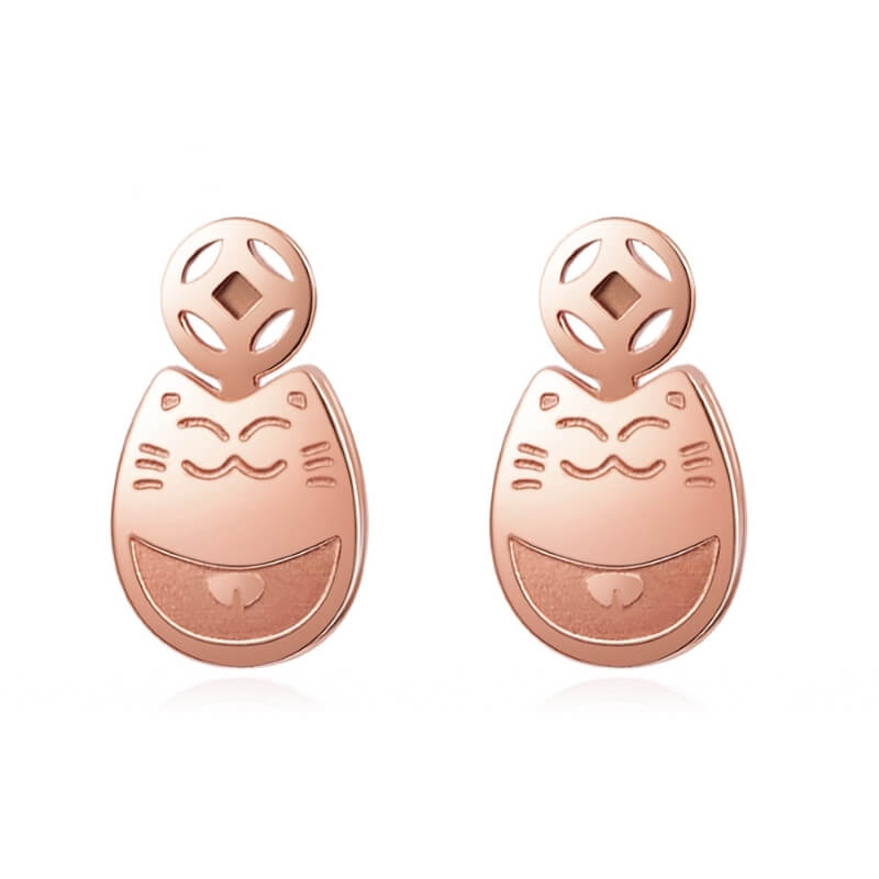 rose gold cat stud earrings on white background 2631595-rose-gold-color