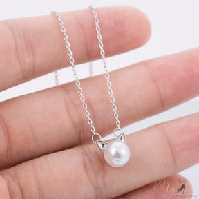 pearl cat necklace in sterling silver held in hand 5770505-silver-plated